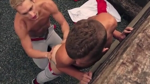 Two Baseball boys nailing Each Other